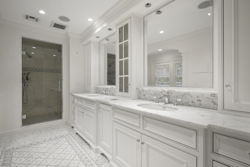 121 Livingston Road Wellesley, MA 02482 - Photo 17 of 42 a bathroom with a sink and a mirror