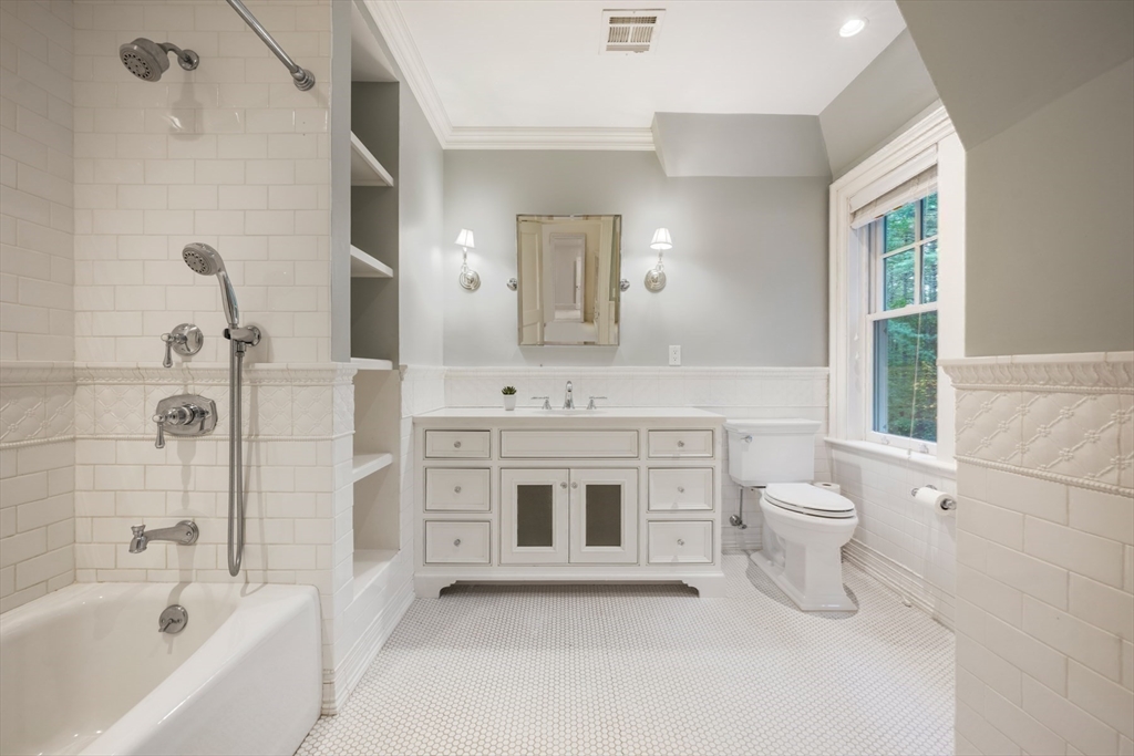 121 Livingston Road Wellesley, MA 02482 - Photo 20 of 42 a spacious bathroom with a granite countertop sink a toilet and shower