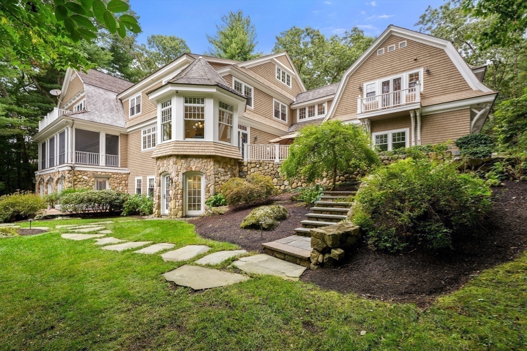 121 Livingston Road Wellesley, MA 02482 - Photo 36 of 42 a front view of a house with a yard