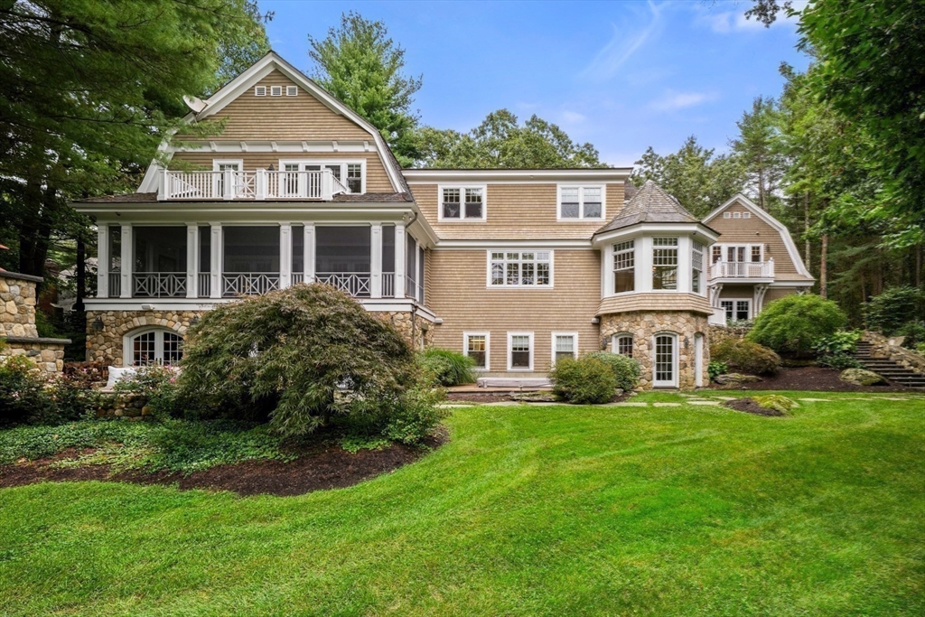 121 Livingston Road Wellesley, MA 02482 - Photo 37 of 42 a front view of a house with a yard