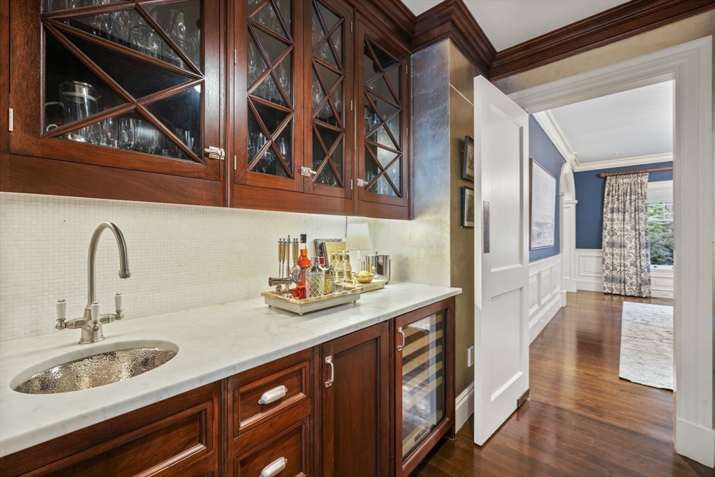 121 Livingston Road Wellesley, MA 02482 - Photo 6 of 42 a kitchen with a sink and cabinets