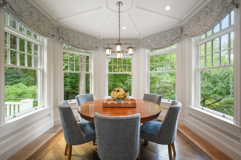 121 Livingston Road Wellesley, MA 02482 - Photo 10 of 42 a dining room with furniture window wooden floor and garden view