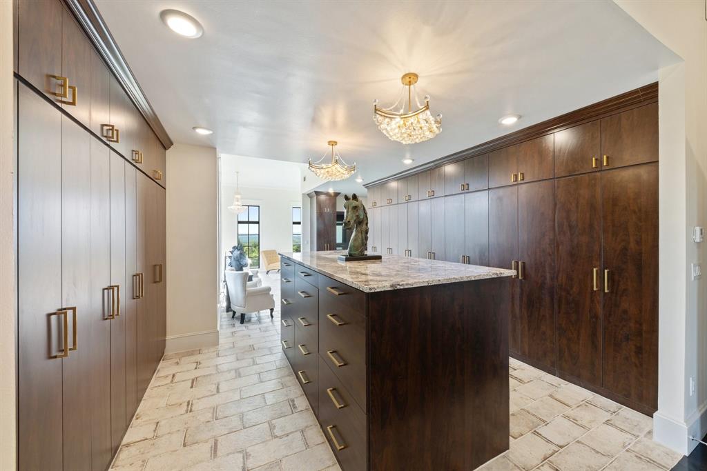 124 Private Road 2202 Decatur, TX 76234 - Photo 23 of 40 a bathroom with a double vanity sink and a mirror