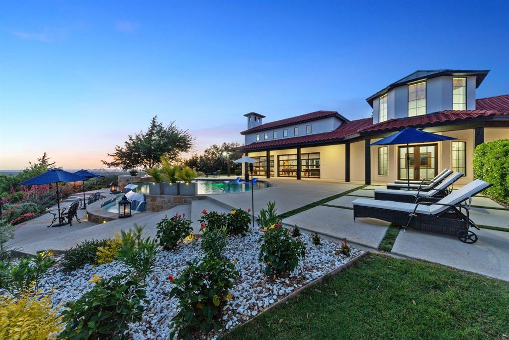 124 Private Road 2202 Decatur, TX 76234 - Photo 28 of 40 a front view of a house with a garden