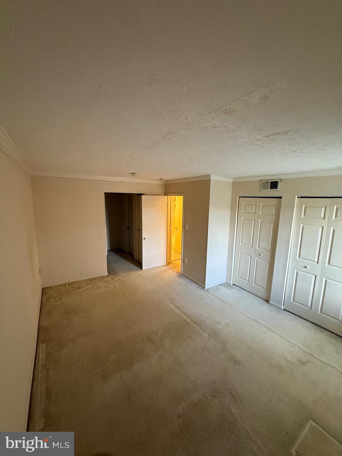 7919 Mandan Road, Unit 301 Greenbelt, MD 20770 - Photo 6 of 10 Primary Bedroom