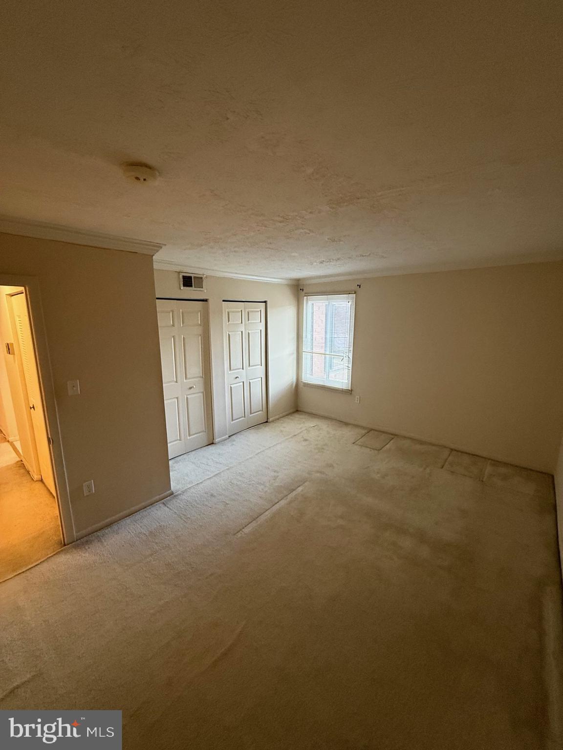 7919 Mandan Road, Unit 301 Greenbelt, MD 20770 - Photo 7 of 10 Primary Bedroom