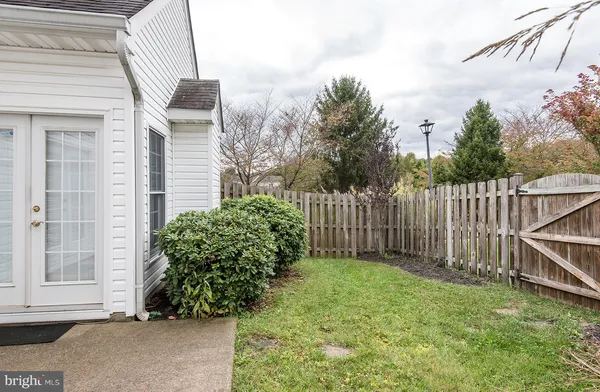 a view of a backyard with garden