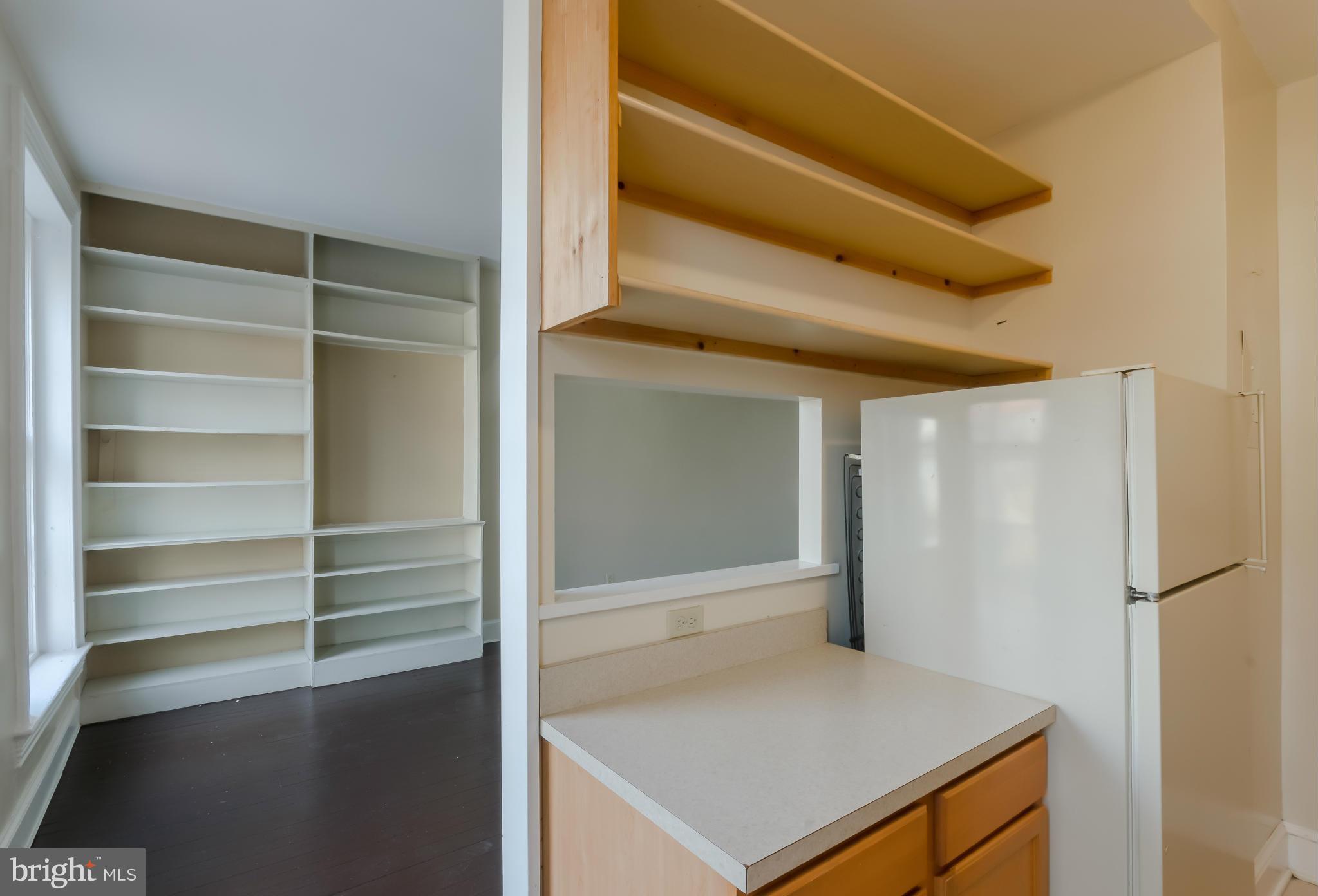 10 7th Street Northeast Washington, DC 20002 - Photo 13 of 30 a view of walk in closet with empty racks
