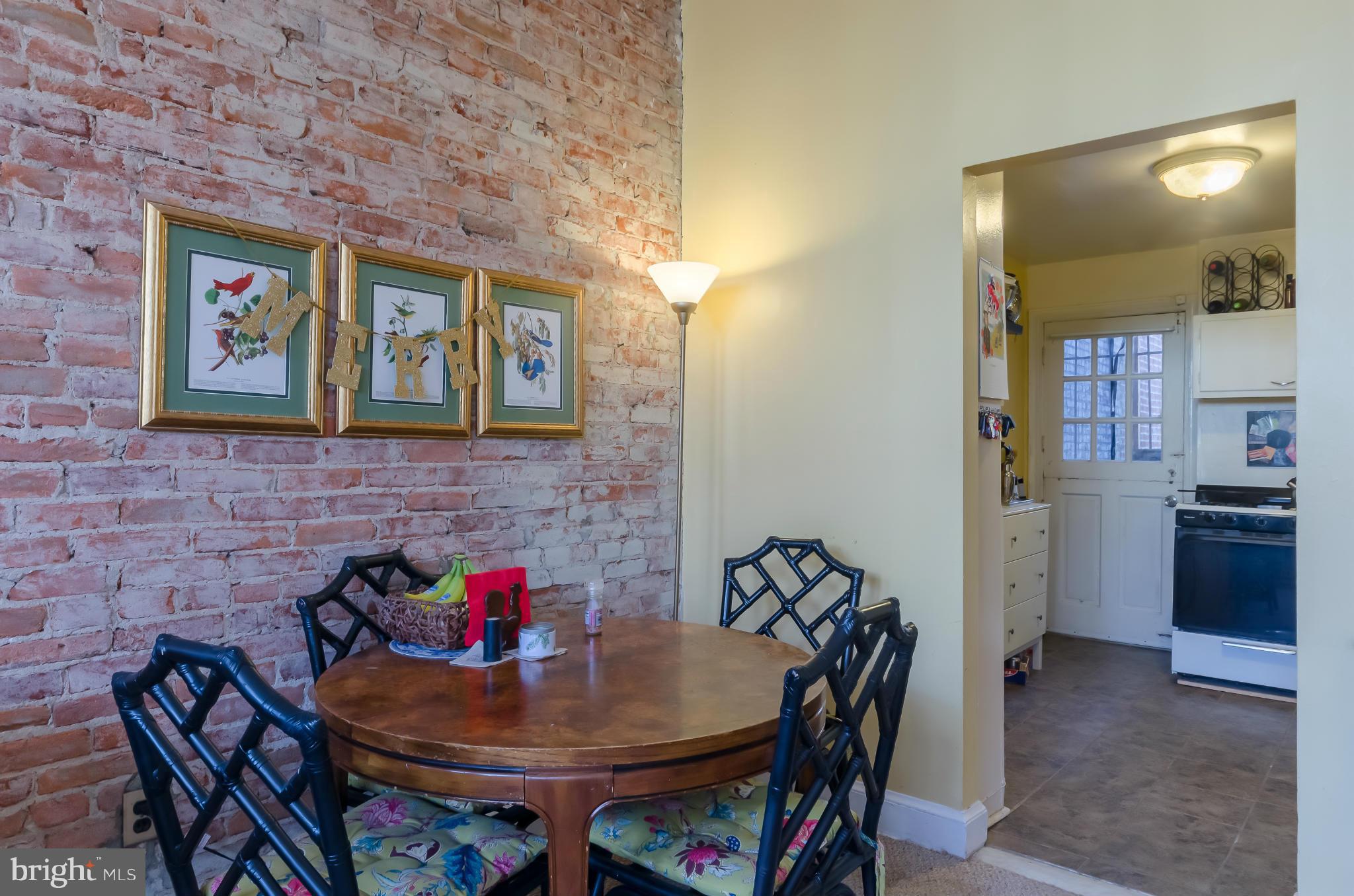 10 7th Street Northeast Washington, DC 20002 - Photo 4 of 30 a dining room with furniture and window