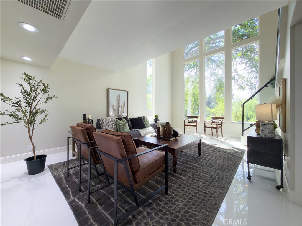 374 Stilson Canyon Road Chico, CA 95928 - Photo 18 of 37 a living room with furniture a table and a large window