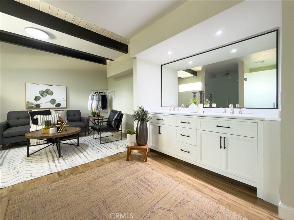 374 Stilson Canyon Road Chico, CA 95928 - Photo 21 of 37 a living room with furniture a mirror and a sink