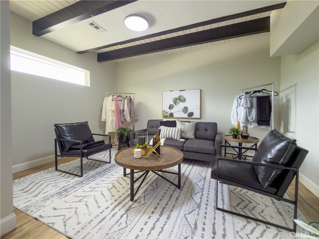 374 Stilson Canyon Road Chico, CA 95928 - Photo 22 of 37 a living room with furniture and a wooden floor