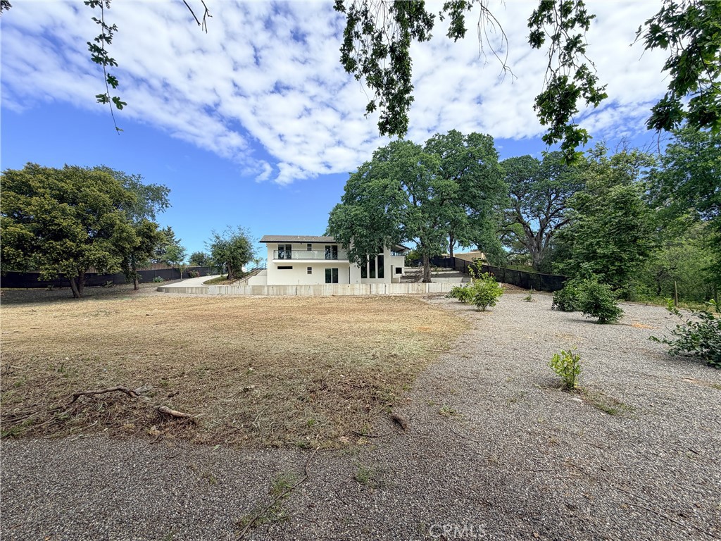 374 Stilson Canyon Road Chico, CA 95928 - Photo 28 of 37 a view of dirt field with large trees