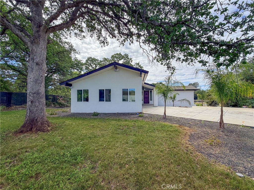 374 Stilson Canyon Road Chico, CA 95928 - Photo 34 of 37 a house that has a tree in front of it