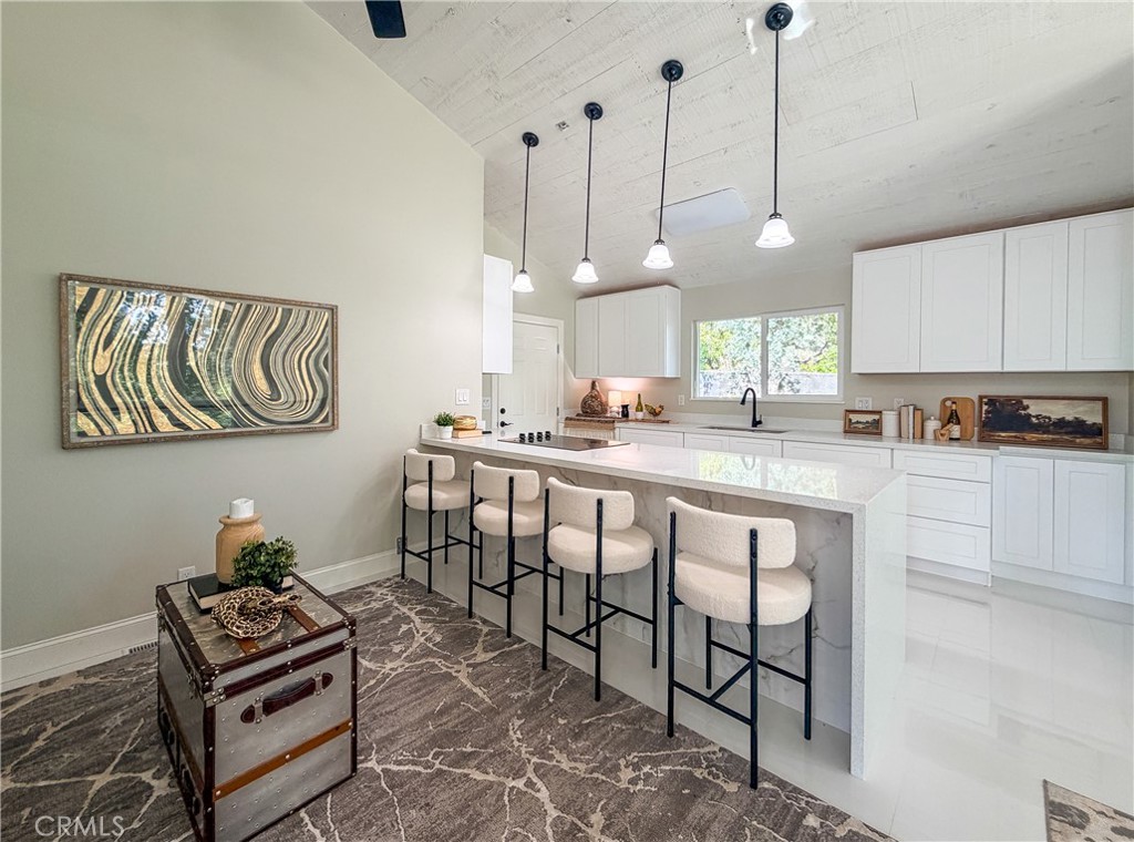 374 Stilson Canyon Road Chico, CA 95928 - Photo 6 of 37 a kitchen with stainless steel appliances kitchen island granite countertop a stove a sink and a cabinets