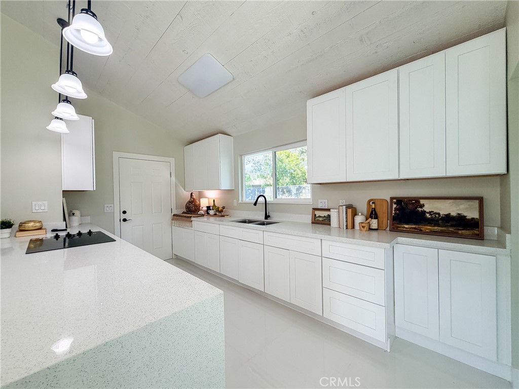 374 Stilson Canyon Road Chico, CA 95928 - Photo 7 of 37 a kitchen with cabinets a sink and appliances