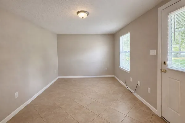 an empty room with windows