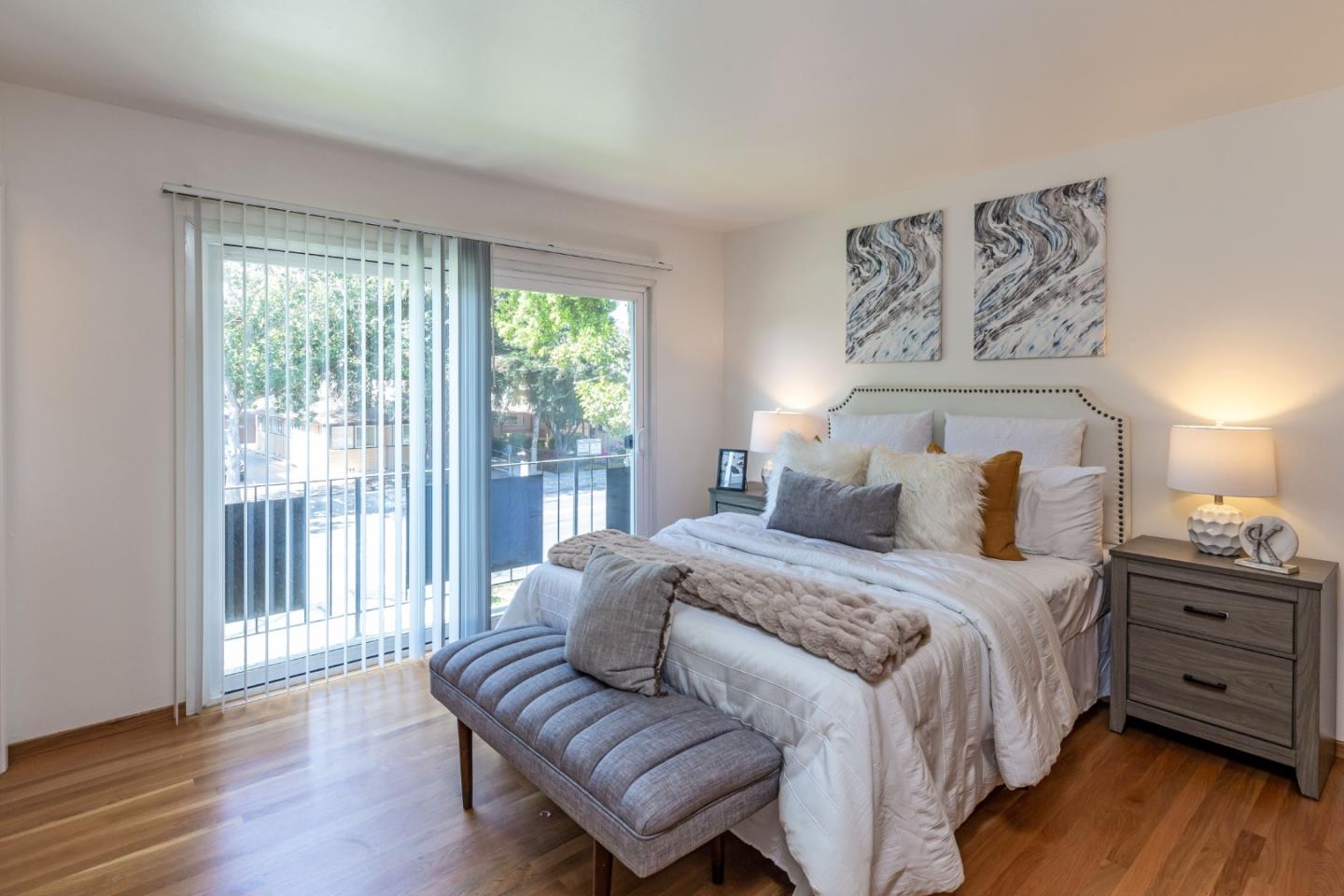 759 Middlefield Road Palo Alto, CA 94301 - Photo 14 of 35 a bedroom with a bed and wooden floor