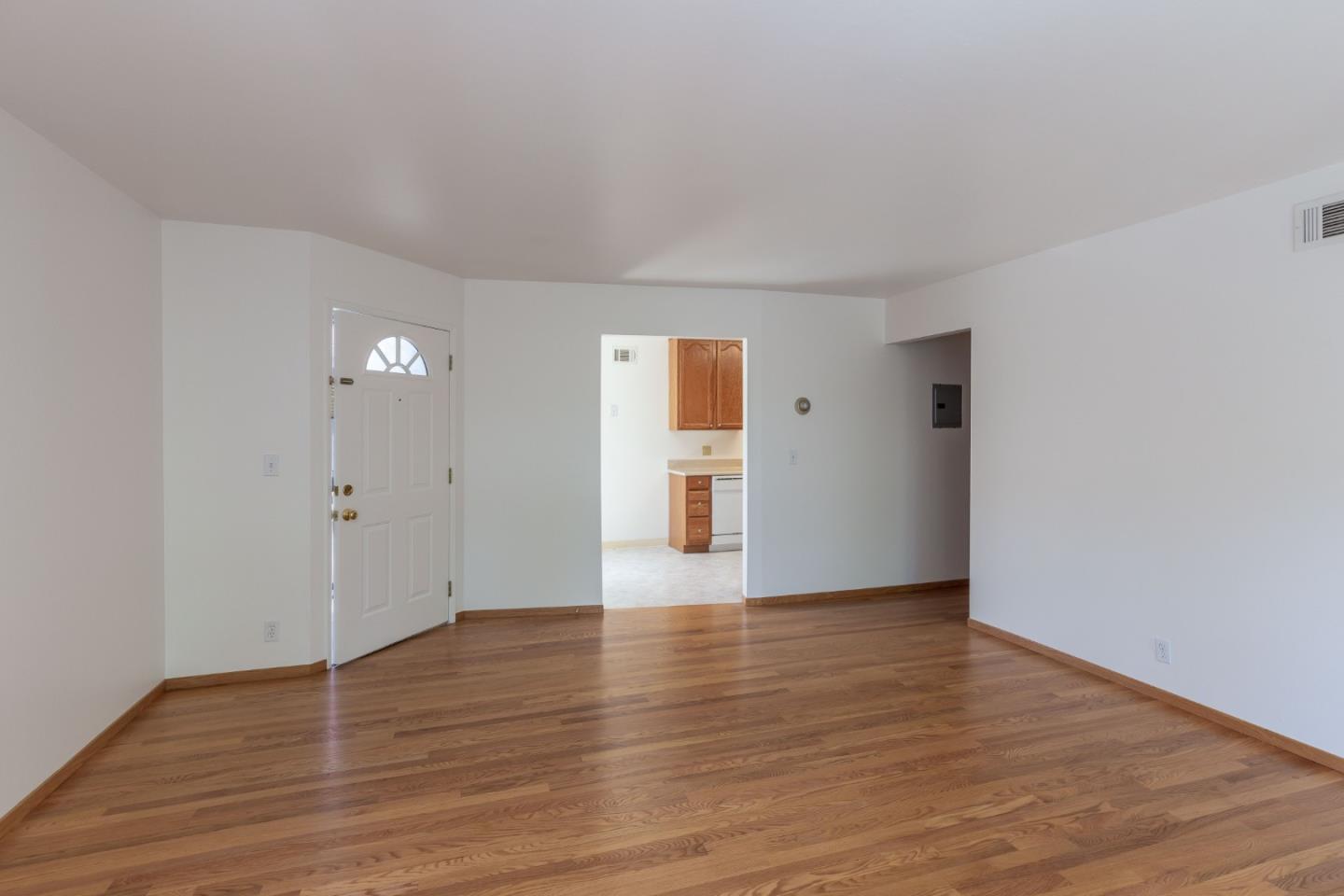 759 Middlefield Road Palo Alto, CA 94301 - Photo 19 of 35 a view of an empty room with wooden floor and a window