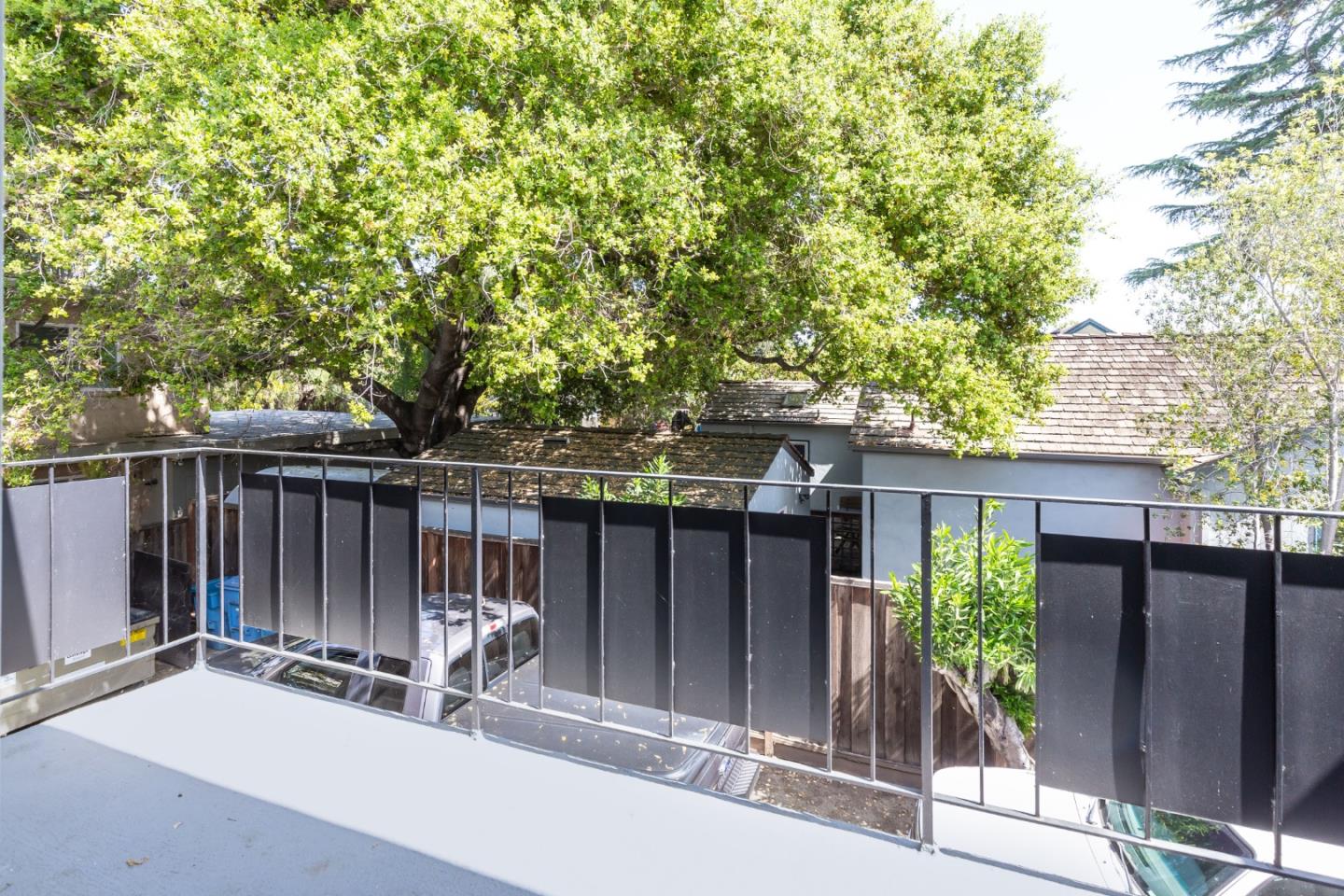 759 Middlefield Road Palo Alto, CA 94301 - Photo 21 of 35 a view of house with a large window and wooden fence