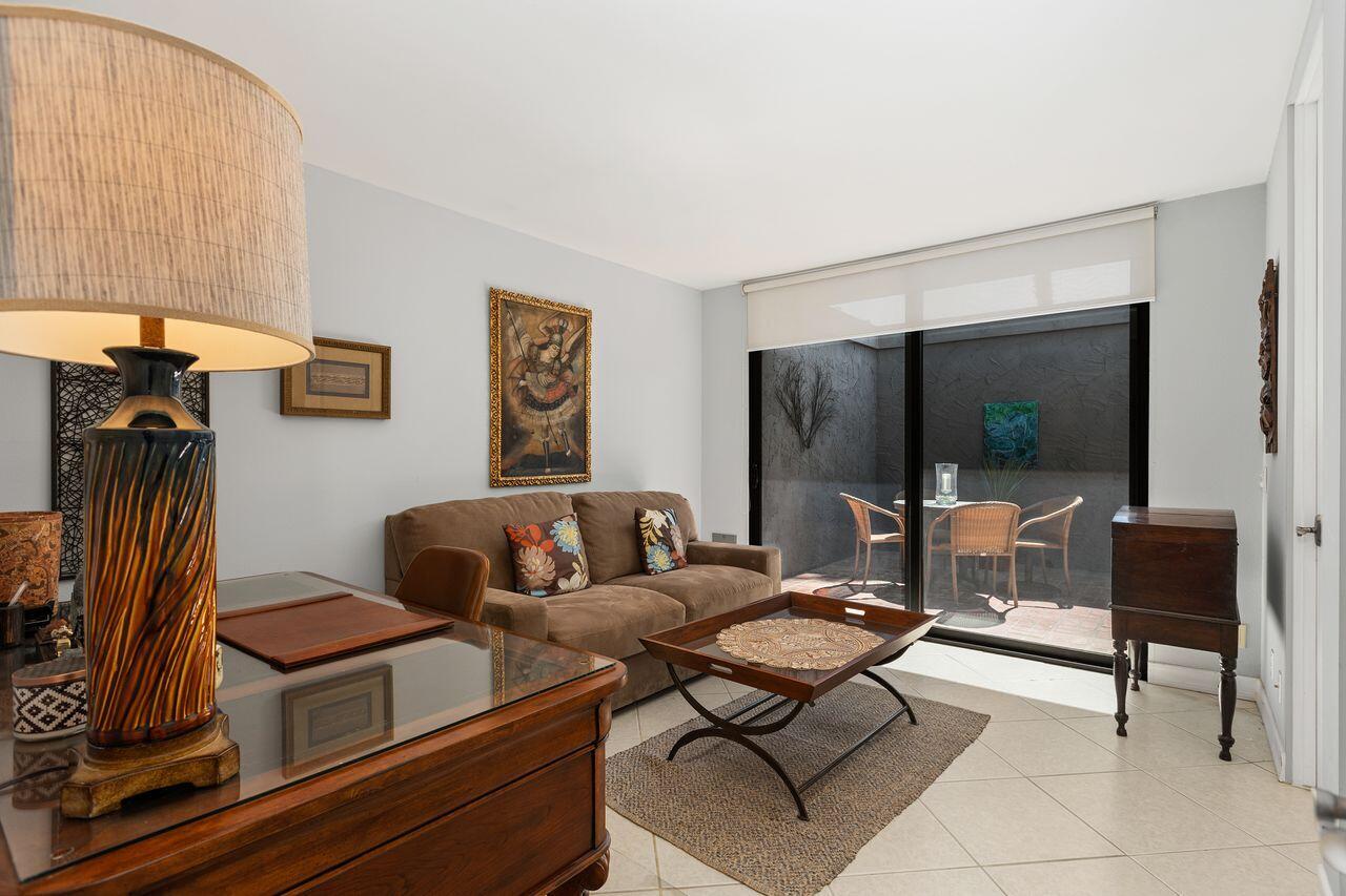 45475 Pueblo Road Indian Wells, CA 92210 - Photo 18 of 30 a living room with furniture and a flat screen tv