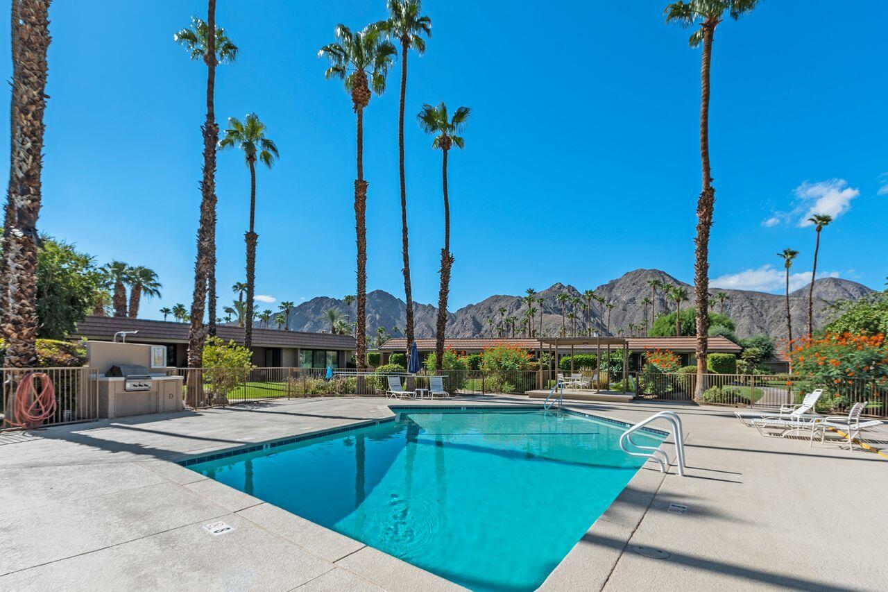 45475 Pueblo Road Indian Wells, CA 92210 - Photo 28 of 30 a view of a lake with a table and chairs