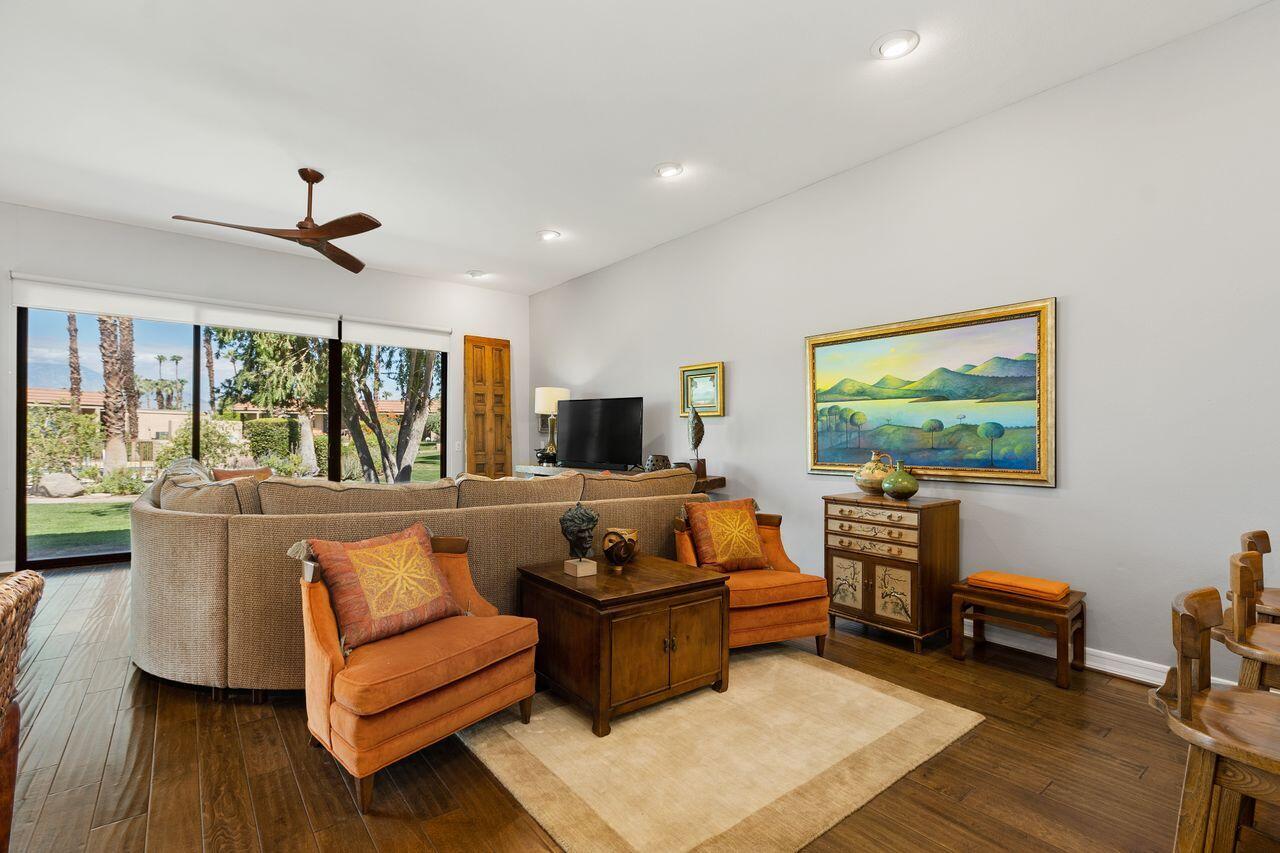 45475 Pueblo Road Indian Wells, CA 92210 - Photo 3 of 30 a living room with furniture and a flat screen tv