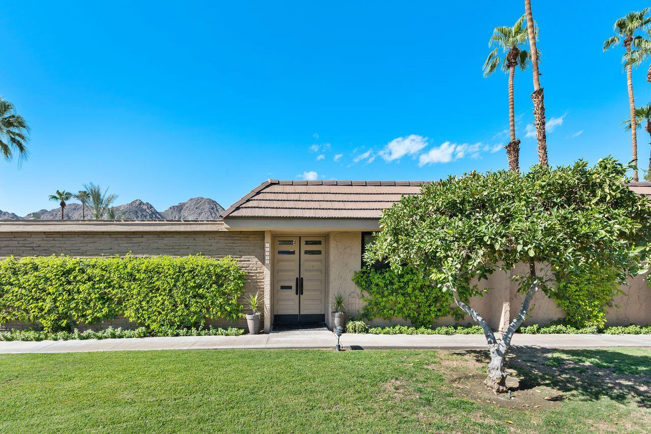45475 Pueblo Road Indian Wells, CA 92210 - Photo 6 of 30 a view of a house with a yard