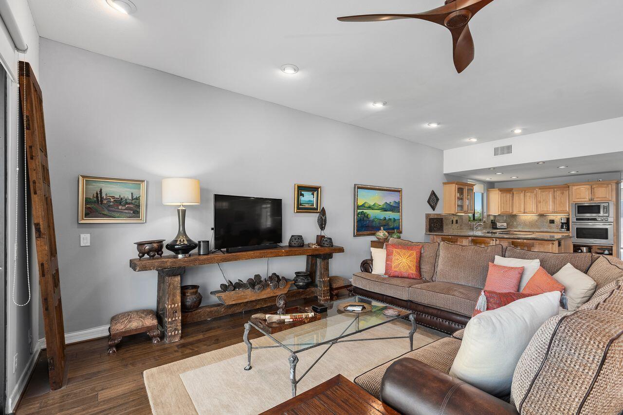 45475 Pueblo Road Indian Wells, CA 92210 - Photo 8 of 30 a living room with furniture and a flat screen tv