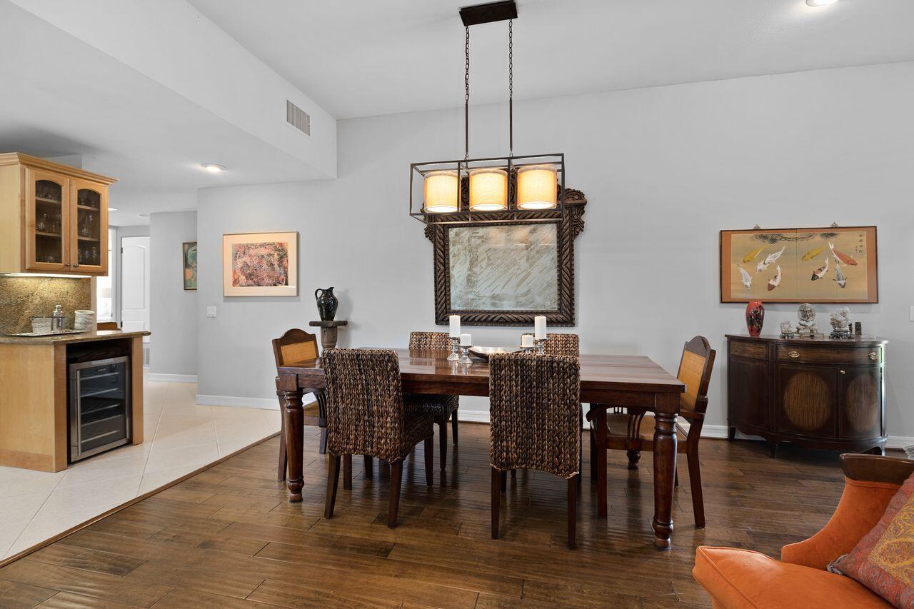 45475 Pueblo Road Indian Wells, CA 92210 - Photo 10 of 30 a view of a dining room with furniture window and wooden floor
