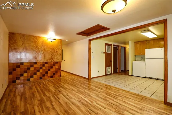 a view of a livingroom with wooden floor