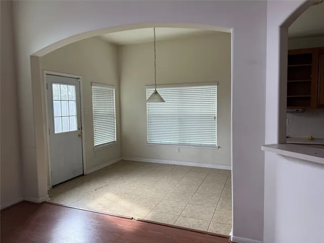 a view of a room that has a window in it
