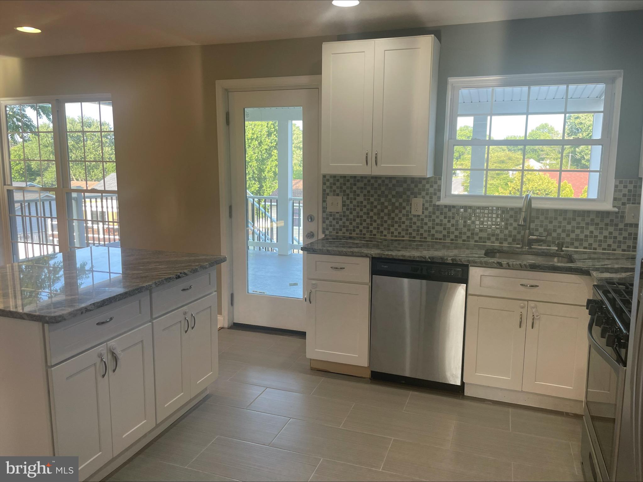331 Timber Grove Road Owings Mills, MD 21117 - Photo 10 of 16 Kitchen with Atrium Door to Large Covered Porch!