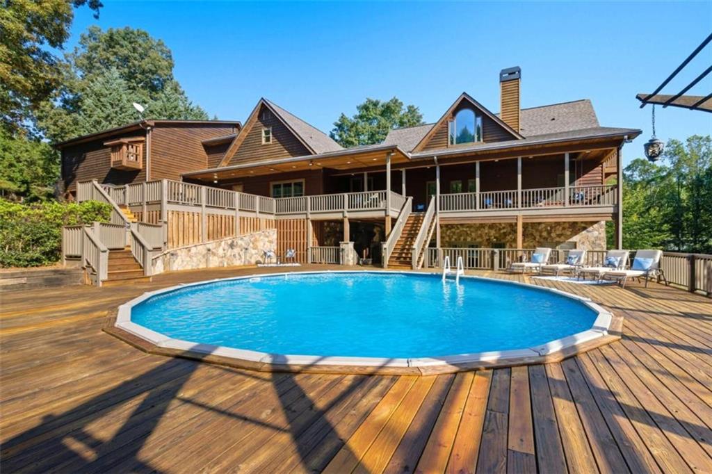 1091 Echota Road Clarkesville, GA 30523 - Photo 66 of 89 a view of house with swimming pool and porch