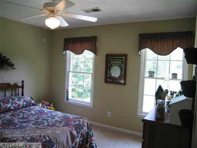 7293 Lee's Ridge Road Oak Ridge, NC 27310 - Photo 11 of 16 3rd Bedroom. Other bedrooms are also spacious and bright!