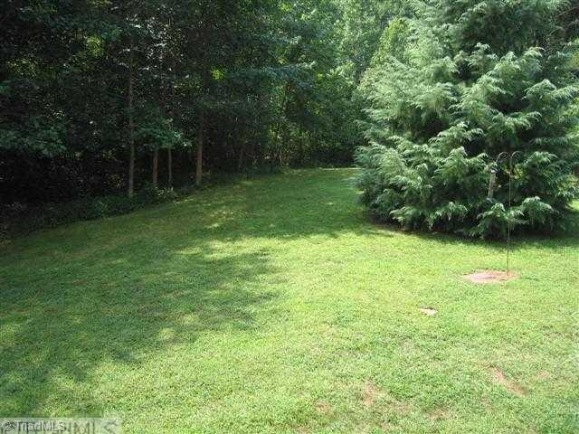 7293 Lee's Ridge Road Oak Ridge, NC 27310 - Photo 16 of 16 Yard/Garden. Large private back yard!