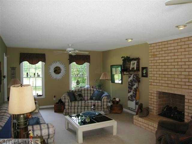 7293 Lee's Ridge Road Oak Ridge, NC 27310 - Photo 6 of 16 Den/Family/Great Room. Large family room with brick fireplace!