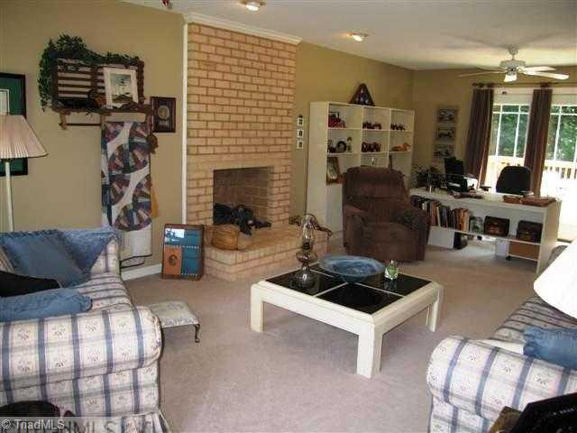 7293 Lee's Ridge Road Oak Ridge, NC 27310 - Photo 7 of 16 Den/Family/Great Room. Large family room with brick fireplace!