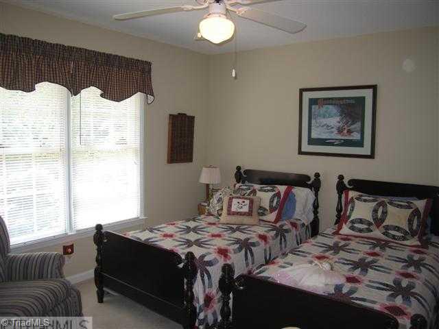 7293 Lee's Ridge Road Oak Ridge, NC 27310 - Photo 10 of 16 2nd Bedroom. Other bedrooms are also spacious and bright!