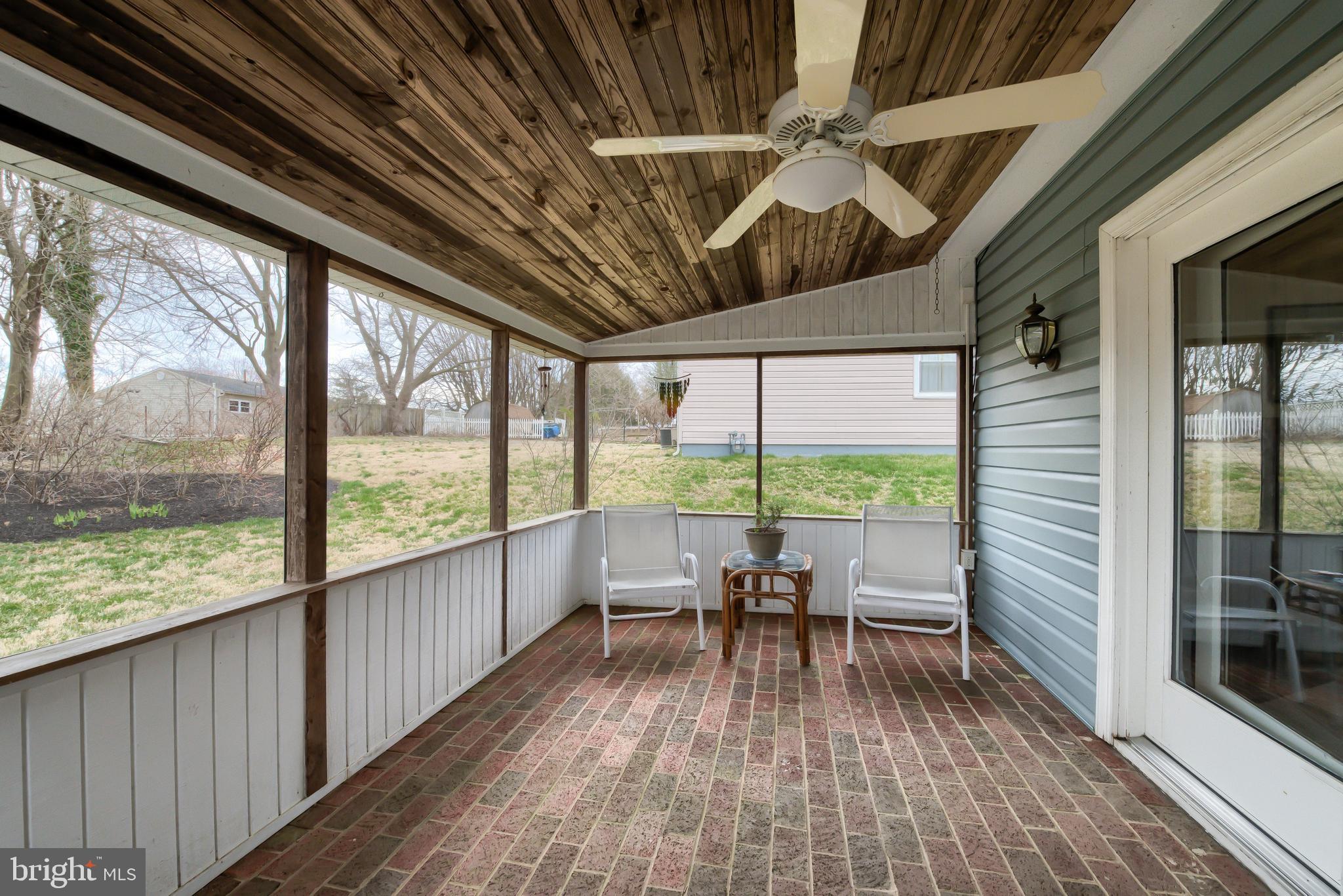 515 Defoe Road Hockessin, DE 19707 - Photo 31 of 40 Lovely screen porch with brick floor