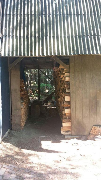 270 Crockett Road Dexter, ME 04930 - Photo 6 of 21 Wood storage area
