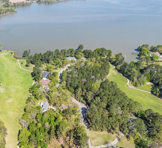 a swimming pool with outdoor seating yard and barbeque oven