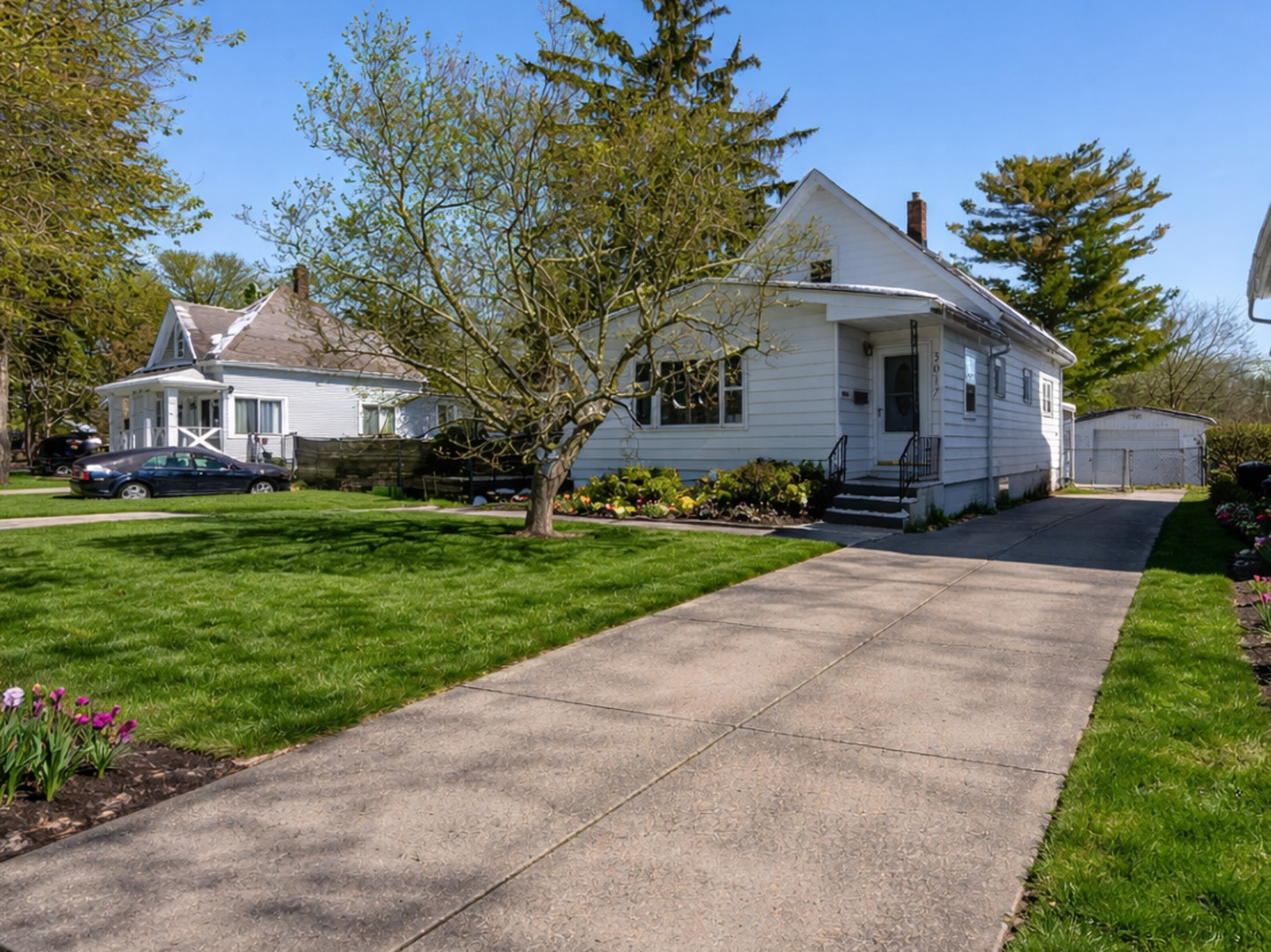 3017 Gabriel Avenue Zion, IL 60099 - Photo 1 of 21 a front view of a house with a yard