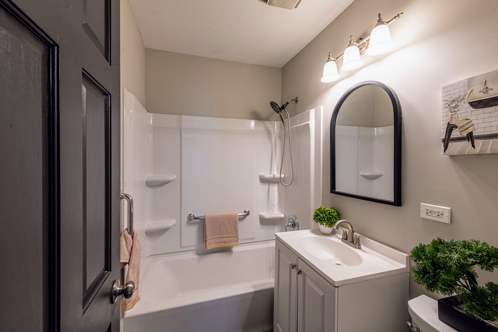 3017 Gabriel Avenue Zion, IL 60099 - Photo 14 of 21 a bathroom with a toilet sink and mirror