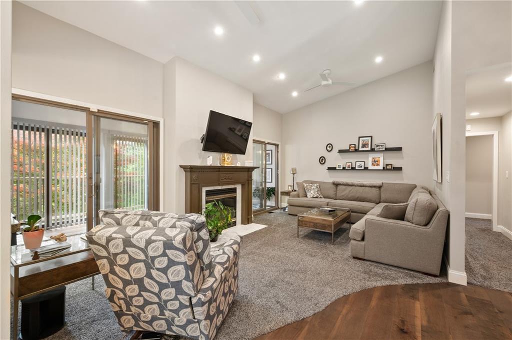 987 Beck Road Leechburg, PA 15656 - Photo 12 of 35 a living room with furniture fireplace and a flat screen tv