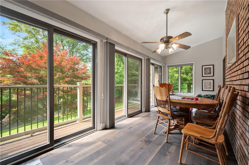987 Beck Road Leechburg, PA 15656 - Photo 14 of 35 a dining room with furniture a chandelier and wooden floor