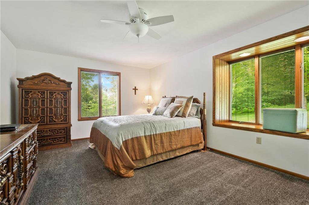 987 Beck Road Leechburg, PA 15656 - Photo 18 of 35 a bedroom with a large bed and a large window