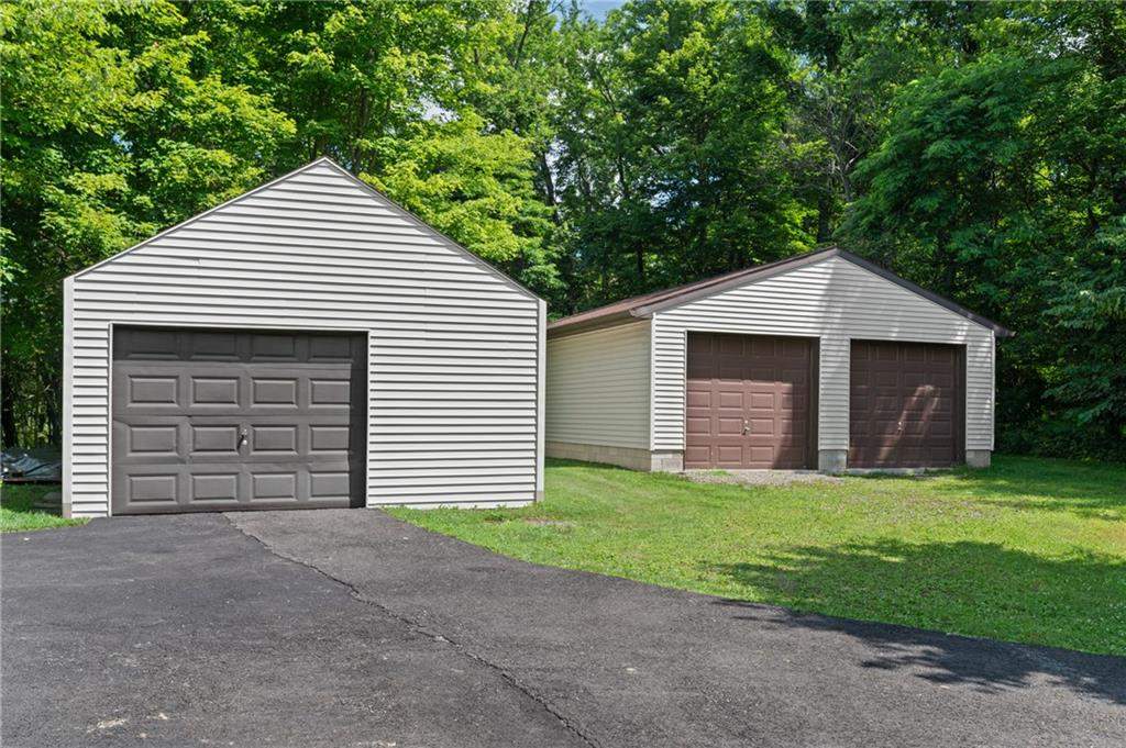 987 Beck Road Leechburg, PA 15656 - Photo 26 of 35 a front view of a house with a yard and garage
