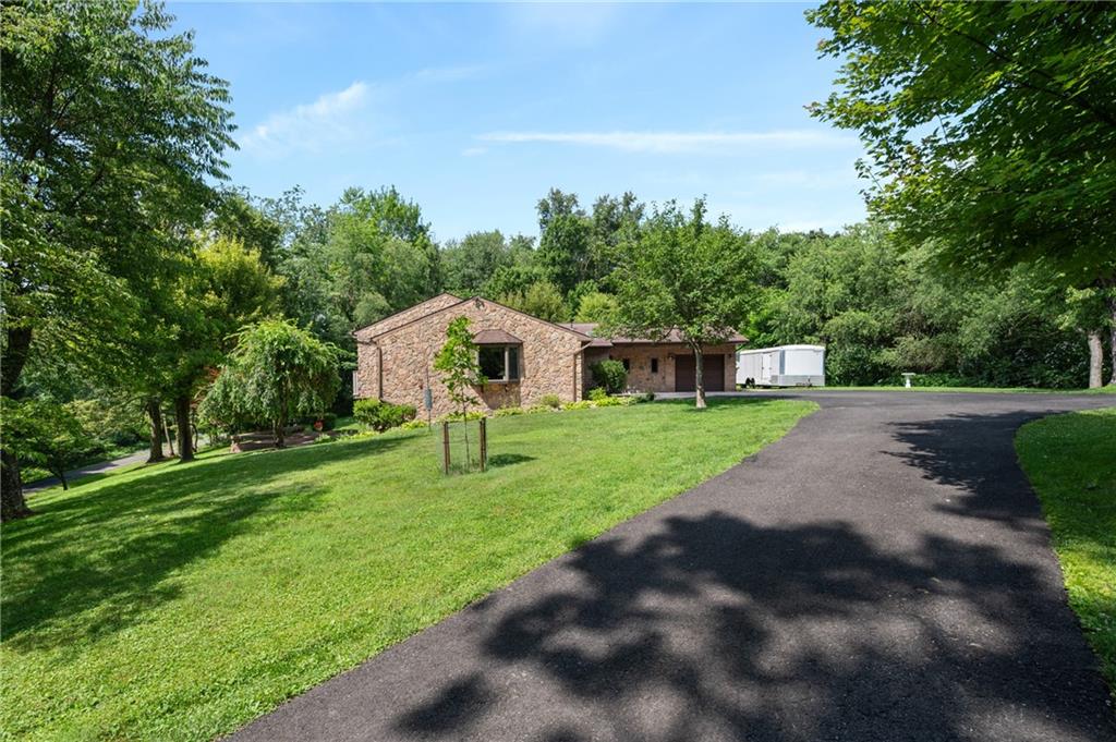 987 Beck Road Leechburg, PA 15656 - Photo 5 of 35 a front view of a house with garden