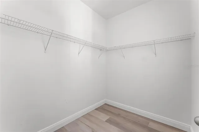 a view of a room with racks on the wall